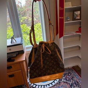 Louis Vuitton Brown Monogram Shoulder Bag with Drawstring Closure